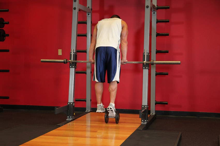 Calf Raise On A Dumbbell position 2