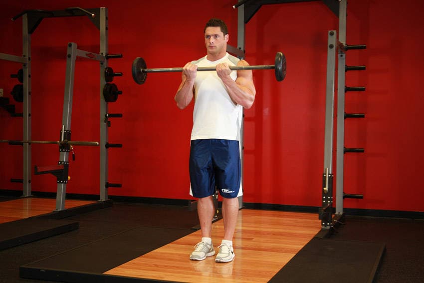 Close-Grip Standing Barbell Curl - ending position