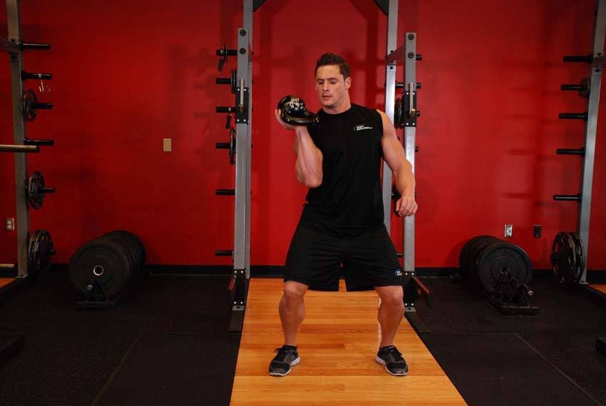 One-Arm Open Palm Kettlebell Clean - ending position