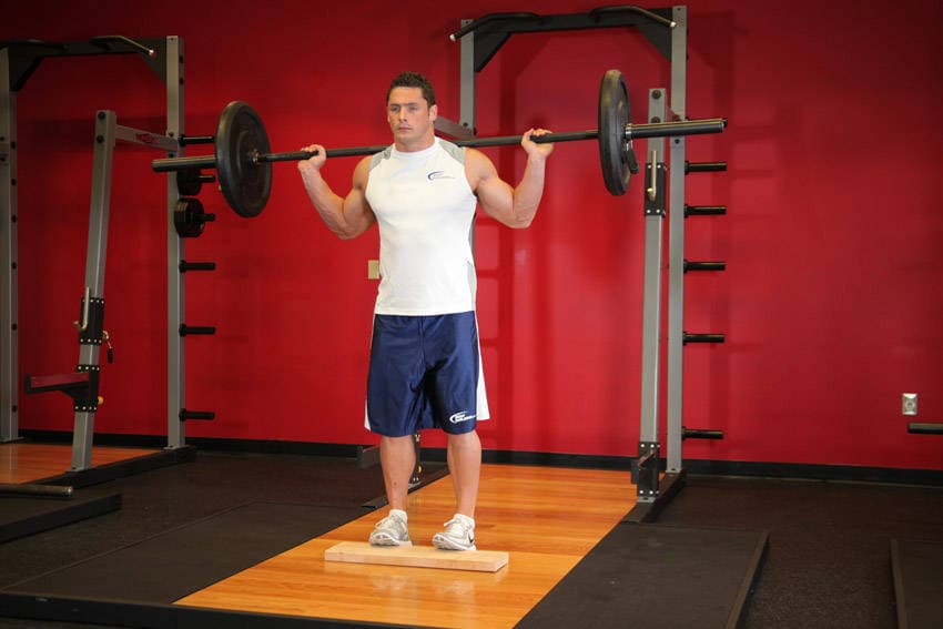 Standing Barbell Calf Raise - ending position