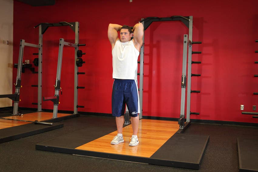 Standing Dumbbell Triceps Extension - ending position