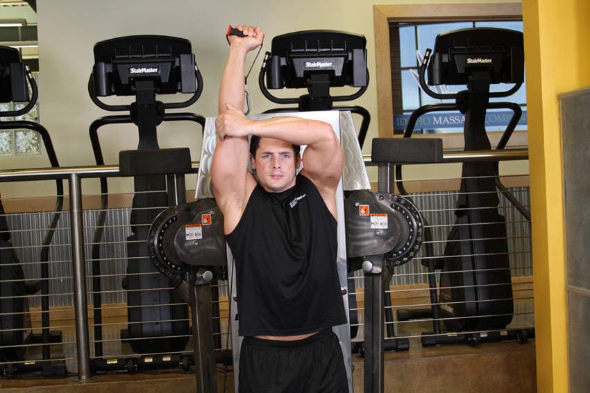Standing Low-Pulley One-Arm Triceps Extension - ending position
